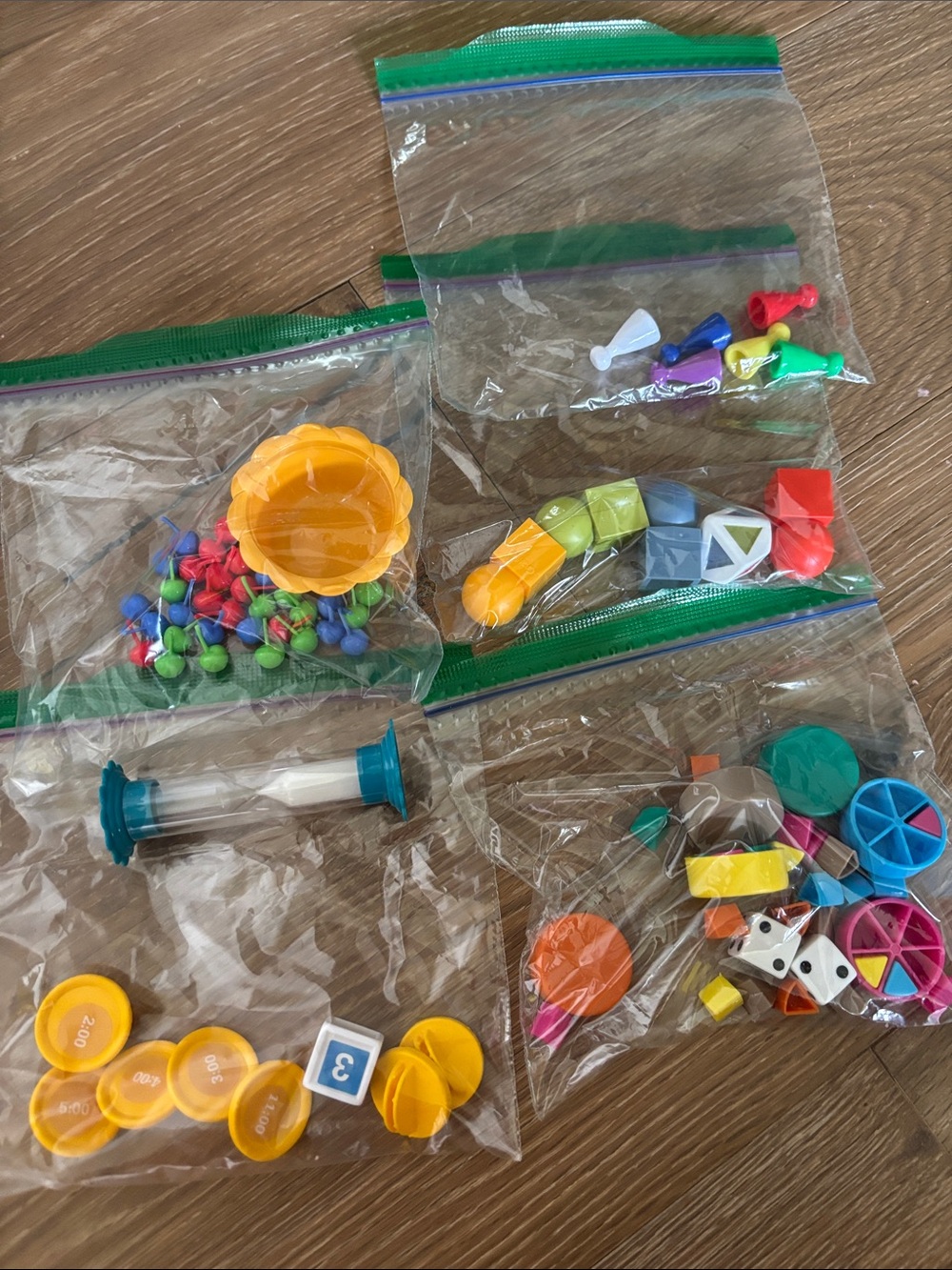 Misc game pieces. Hi ho cherry o, cranium, trivial pursuit etc. 1 minute timer.